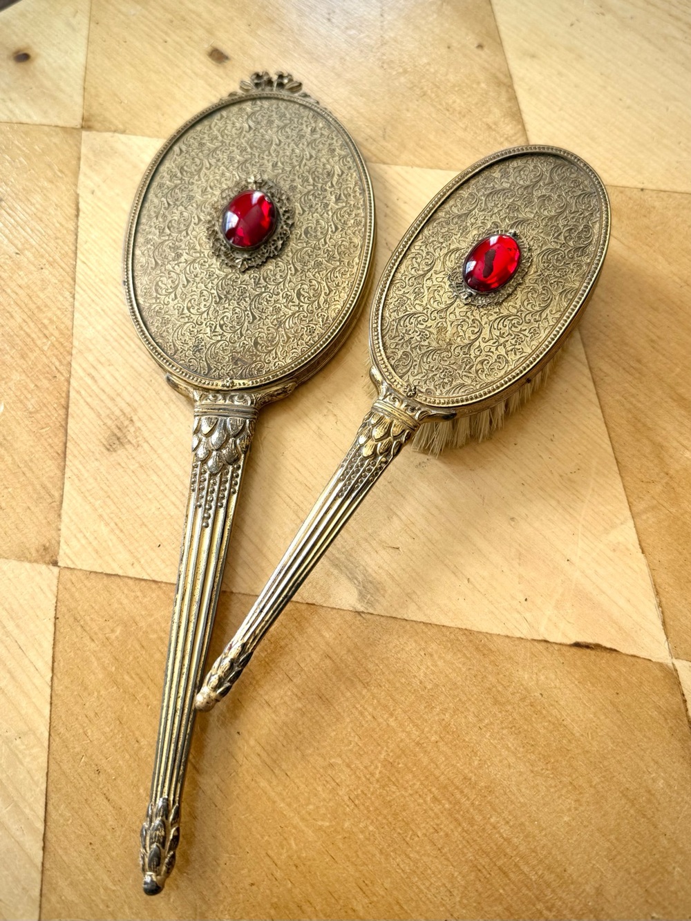 Antique vanity set ormolu filigree hand mirror and hairbrush red gem stone